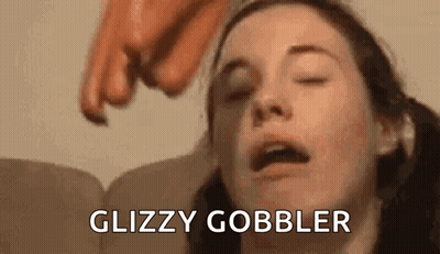 Woman With Eyes Closed Sausage Pointing At Face GIF