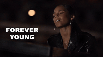 Woman With Eyes Closed Saying Forever Young GIF