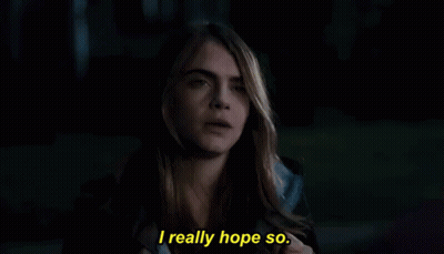 Woman With Eyes Closed Saying I Really Hope So