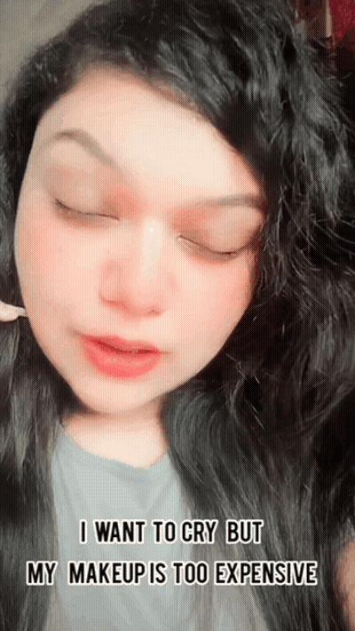 Woman With Eyes Closed Saying I Want To Cry But My Makeup Is Too Expensive GIF