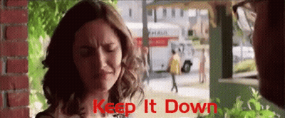 Woman With Eyes Closed Saying Keep It Down GIF