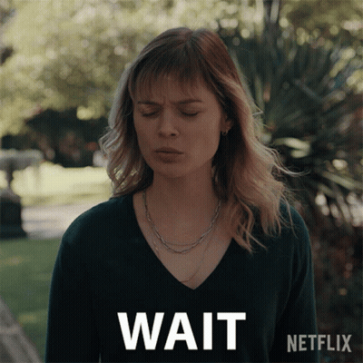 Woman With Eyes Closed Saying Wait GIF