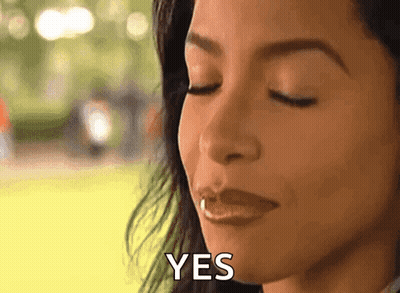 Woman With Eyes Closed Saying Yes GIF