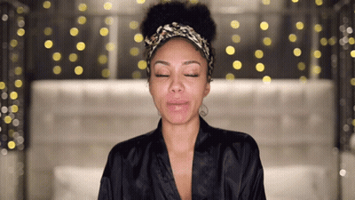 Woman With Eyes Closed Wearing Headband GIF
