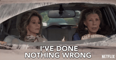 Woman With Eyes Closed Wearing NY Jacket GIF
