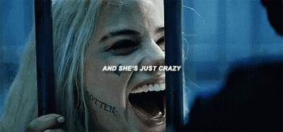 Woman With Face Tattoo Behind Bars GIF