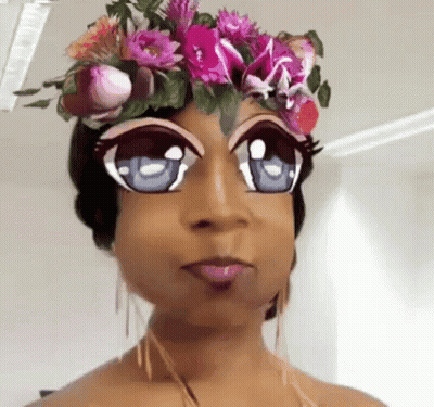 Woman With Flower Crown And Cartoon Eyes GIF