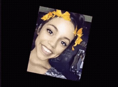 Woman With Flower In Hair Upside Down GIF