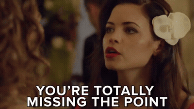 Woman With Flower Saying You're Totally Missing The Point GIF