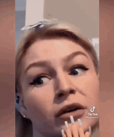 Woman With Fork In Mouth GIF