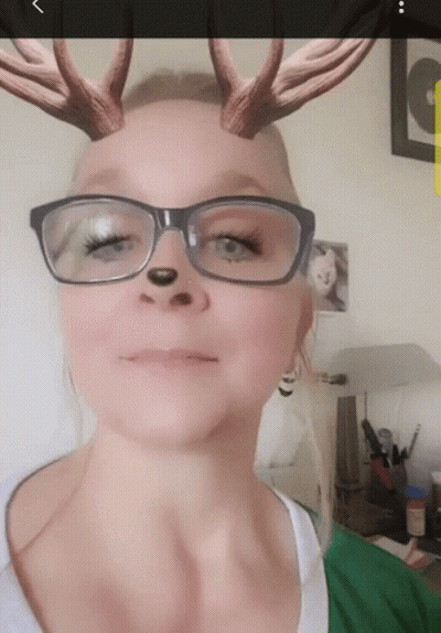 Woman With Glasses And Antlers GIF