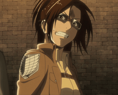 Woman With Glasses And Brick Wall GIF