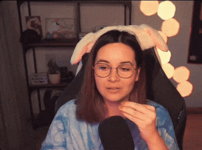 Woman With Glasses And Bunny Ear Headband GIF