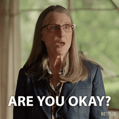 Woman With Glasses And Denim Jacket Saying Are You Okay GIF