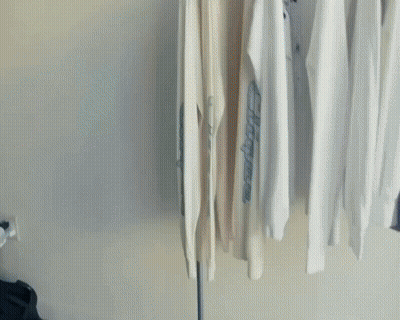 Woman With Glasses And Dreadlocks Getting Hair Done At Salon GIF
