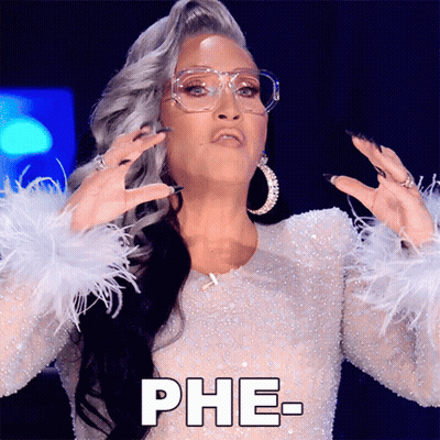 Woman With Glasses And Feathered Sleeves Saying Phe GIF