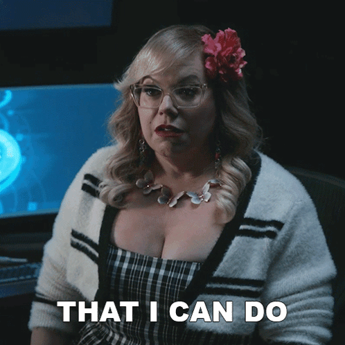 Woman With Glasses And Flower Says That I Can Do GIF