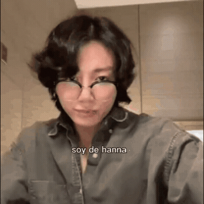 Woman With Glasses And Gray Shirt Talking GIF