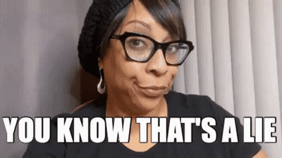 Woman With Glasses And Hat Smiling Saying You Know That's A Lie GIF