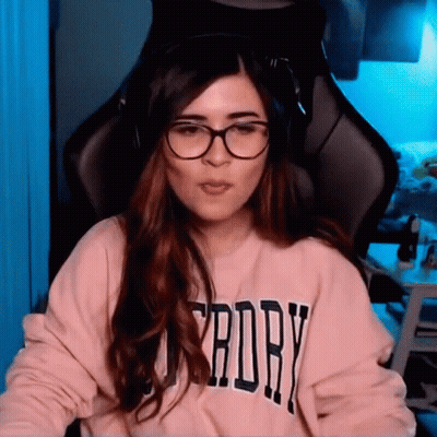 Woman With Glasses And Headphones At Computer GIF