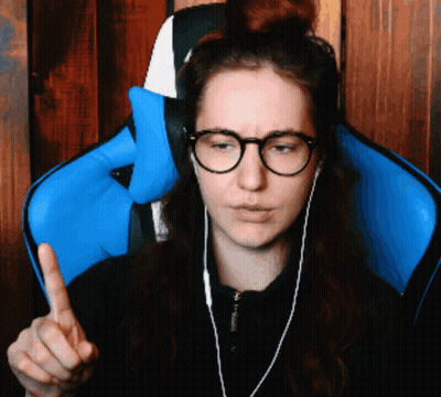 Woman With Glasses And Headphones Giving Middle Finger GIF