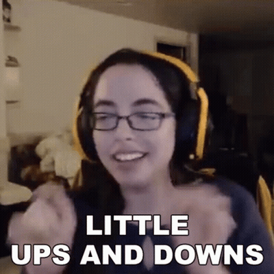 Woman With Glasses And Headphones Making Funny Face Saying Little Ups And Downs GIF