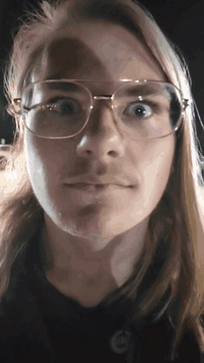Woman With Glasses And Mustache Making Funny Face GIF
