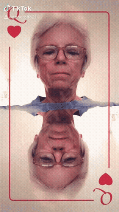 Woman With Glasses And Queen Of Hearts Card GIF