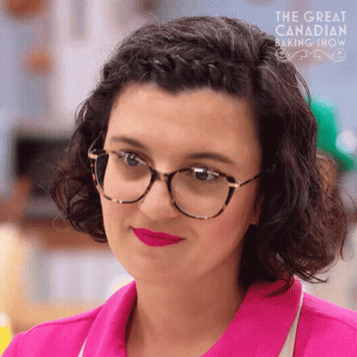Woman With Glasses And Red Lipstick On Great Canadian Baking Show GIF