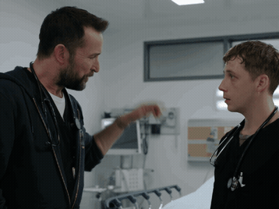 Woman With Glasses And Stethoscope Looks At Camera GIF