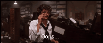 Woman With Glasses And Tie On Phone Oops GIF