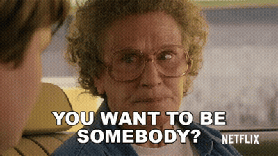 Woman With Glasses Asking If She Wants To Be Somebody On Netflix GIF