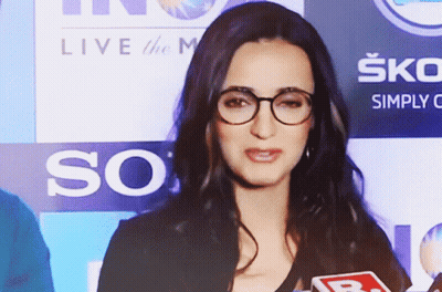 Woman With Glasses At Live The M Sign GIF