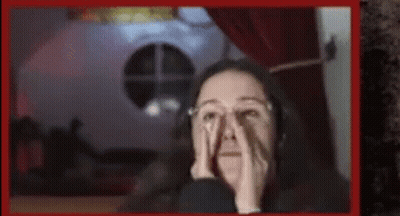 Woman With Glasses Covering Face GIF
