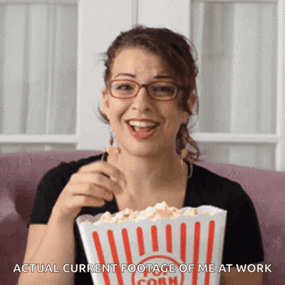 Woman With Glasses Eating Popcorn Actual Current Footage Of Me At Work GIF