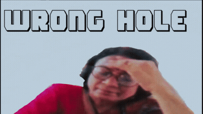 Woman With Glasses Hand To Forehead Saying Wrong Hole GIF