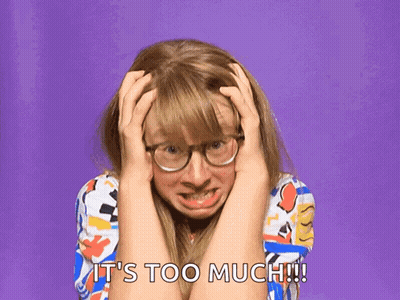 Woman With Glasses Holding Head GIF