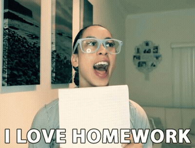Woman With Glasses Holding Paper Saying I Love Homework GIF