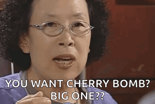 Woman With Glasses Holding Spoon You Want Cherry Bomb Big One GIF