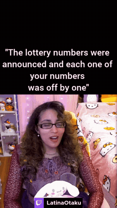 Woman With Glasses Holding Stuffed Animal Saying The Lottery Numbers Were Announced GIF