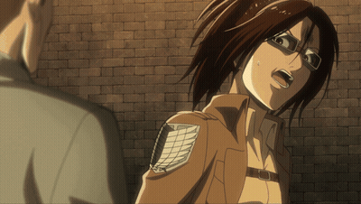 Woman With Glasses In Front Of Brick Wall Mouth Open GIF