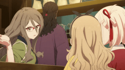 Woman With Glasses Looking In Mirror GIF