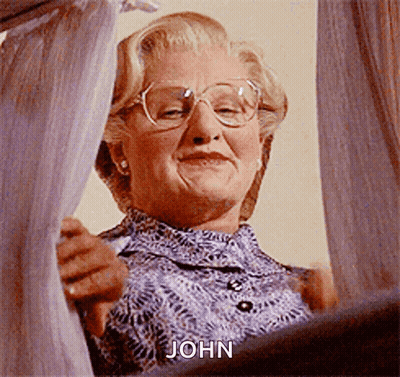 Woman With Glasses Looking Out Window Saying John GIF
