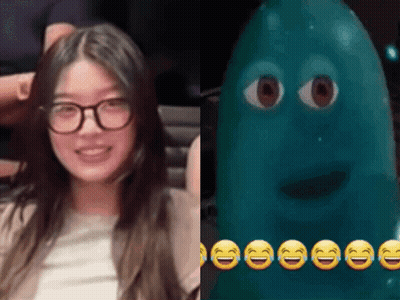 Woman With Glasses Next To Blue Cartoon Character GIF
