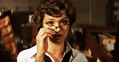 Woman With Glasses On Phone GIF
