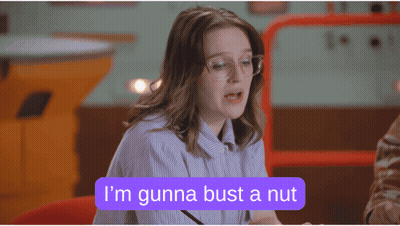 Woman With Glasses Saying Gunna Bust A Nut In Purple Box GIF