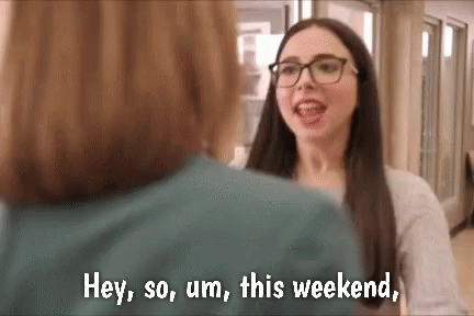 Woman With Glasses Saying Hey So Um This Weekend
