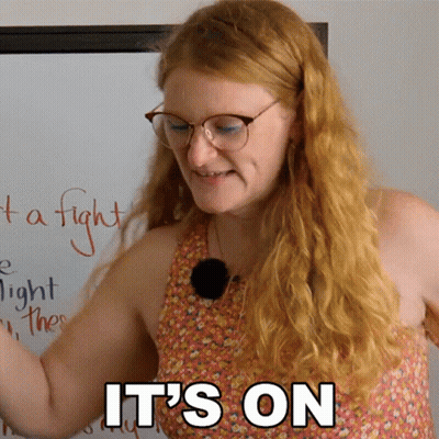 Woman With Glasses Saying It's On GIF