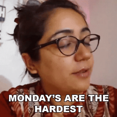 Woman With Glasses Saying Monday's Are The Hardest GIF