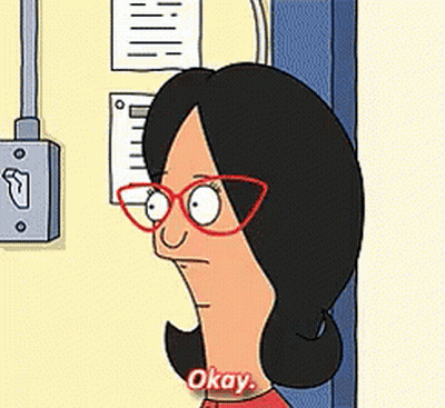 Woman With Glasses Saying Okay GIF